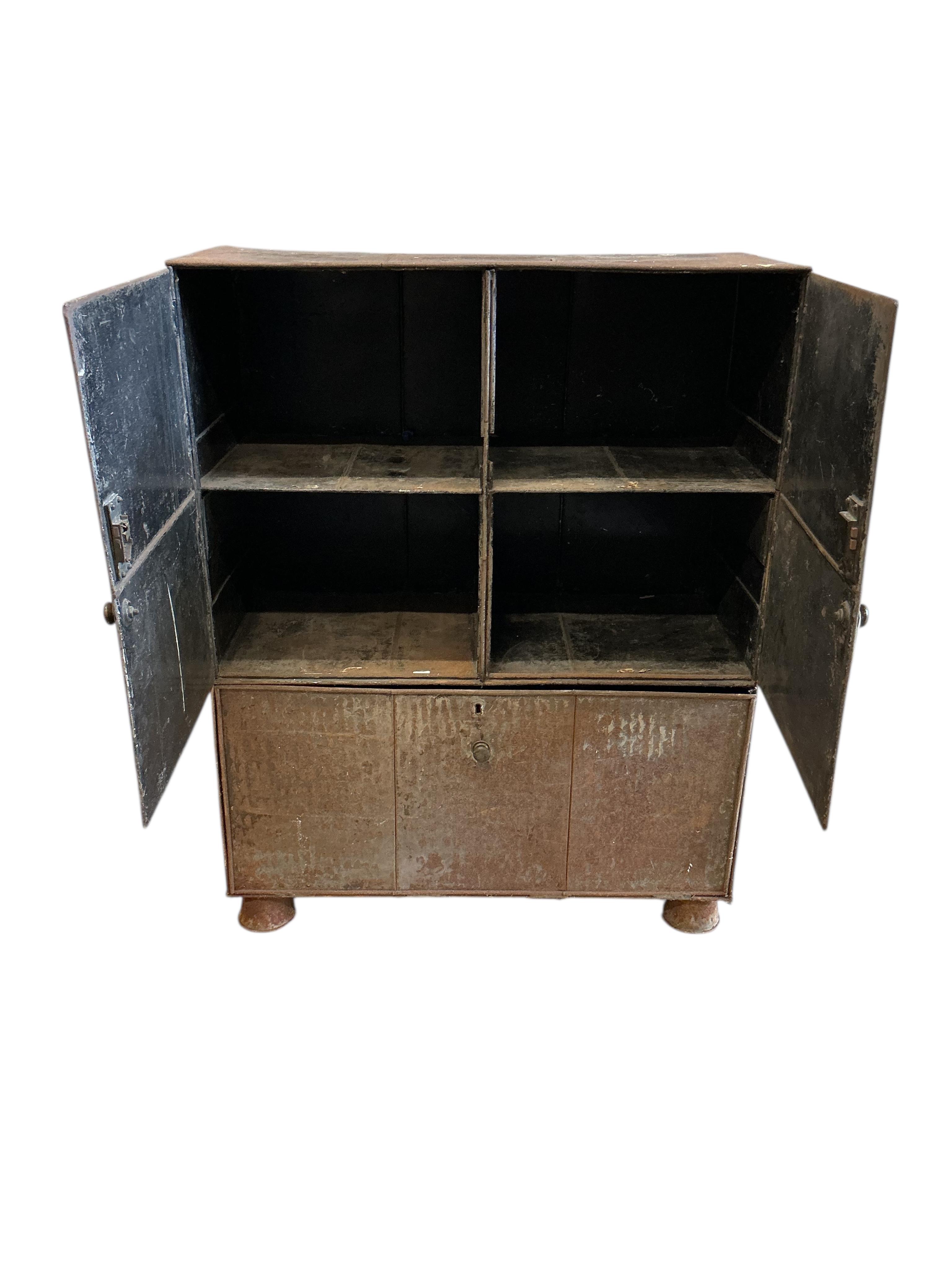 An early 19th century metal Alms chest with traces of original paint, the front with original stencilled legend 